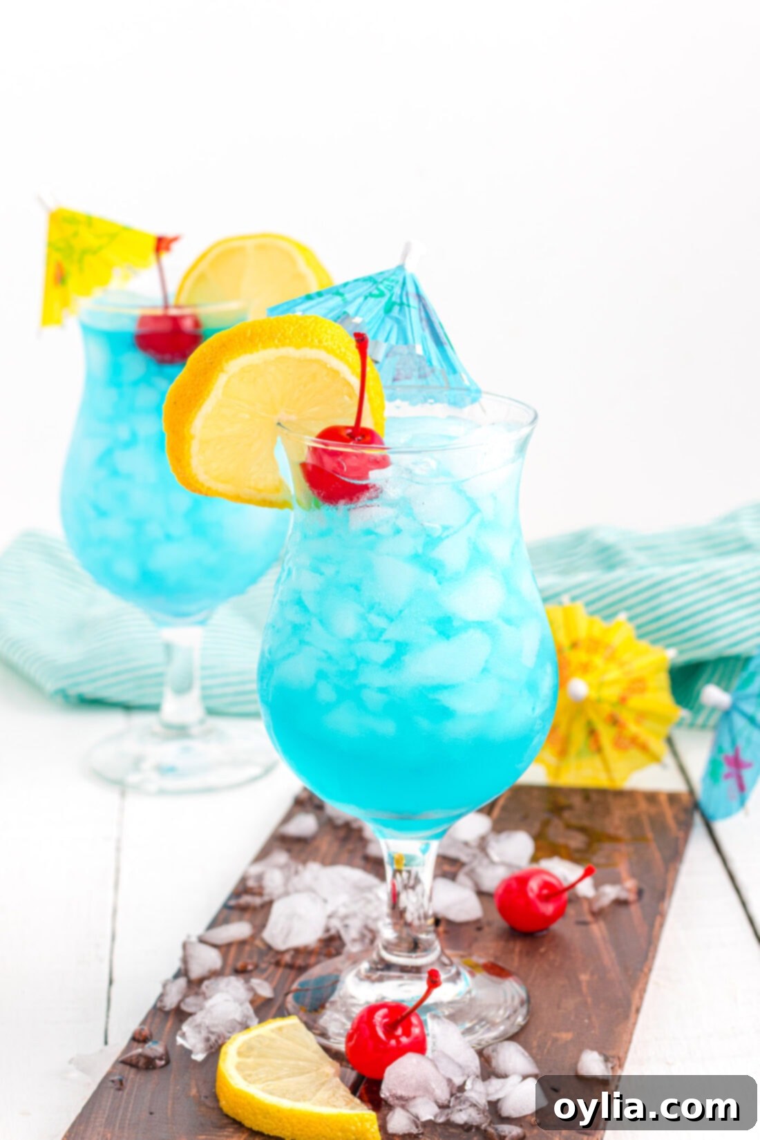 2 Blue Lagoon Cocktails, perfectly garnished and ready to serve