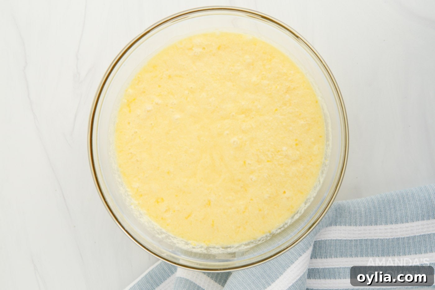 lemon curd mixture in a mixing bowl