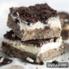 Perfectly layered Oreo Cheesecake Bars ready to be enjoyed.
