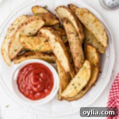 Potato Wedges on a plate, perfectly golden and seasoned