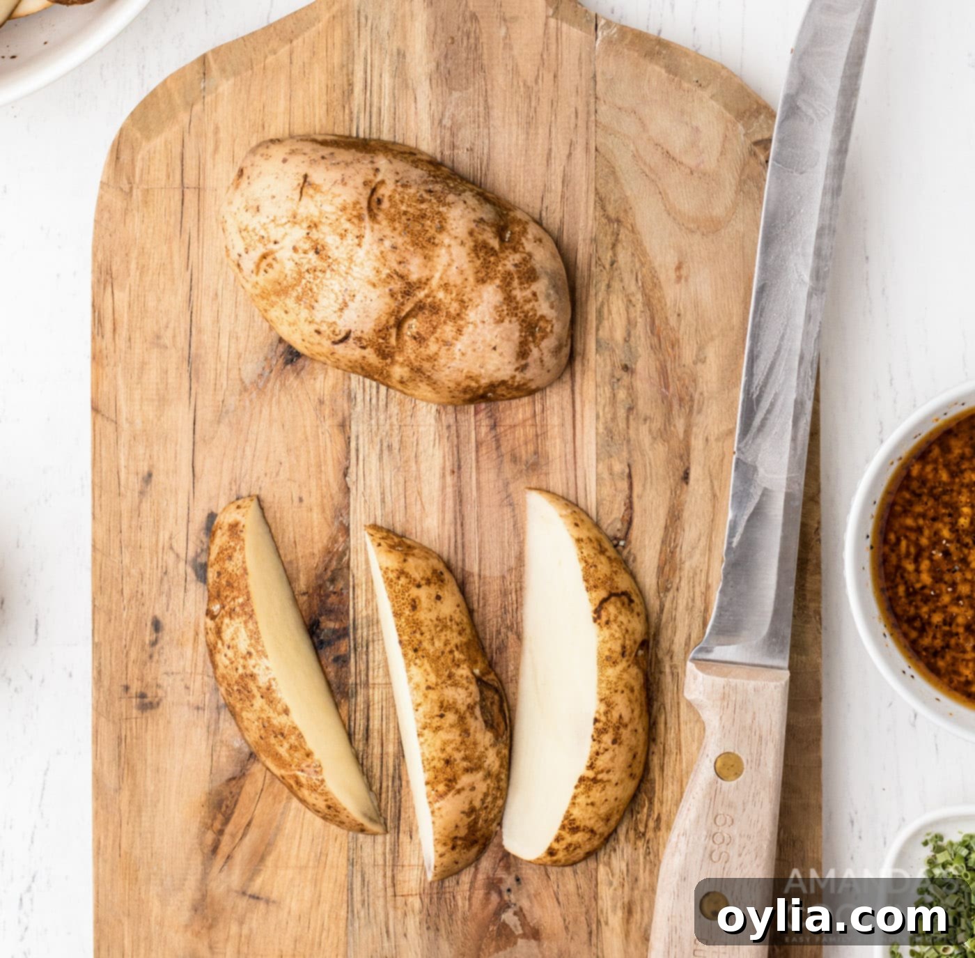 Cutting Russet potatoes into wedges