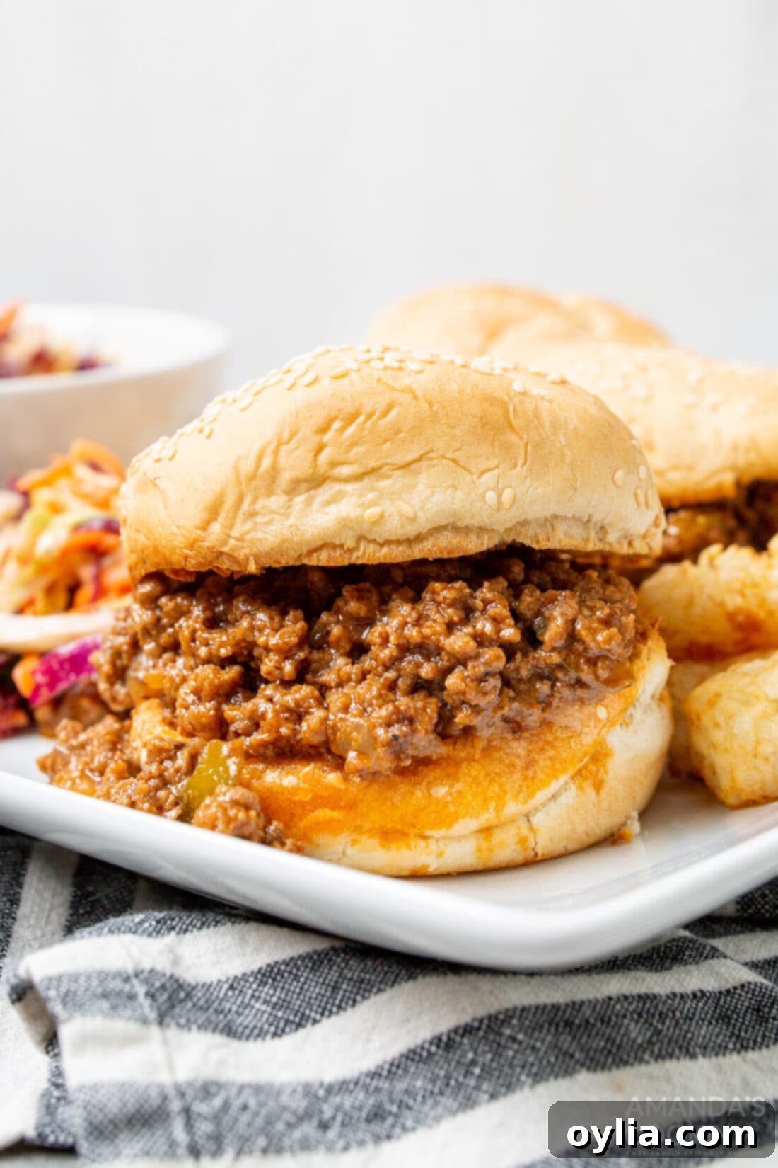 A delicious sloppy joe sandwich made in an Instant Pot, ready to eat on a toasted bun.