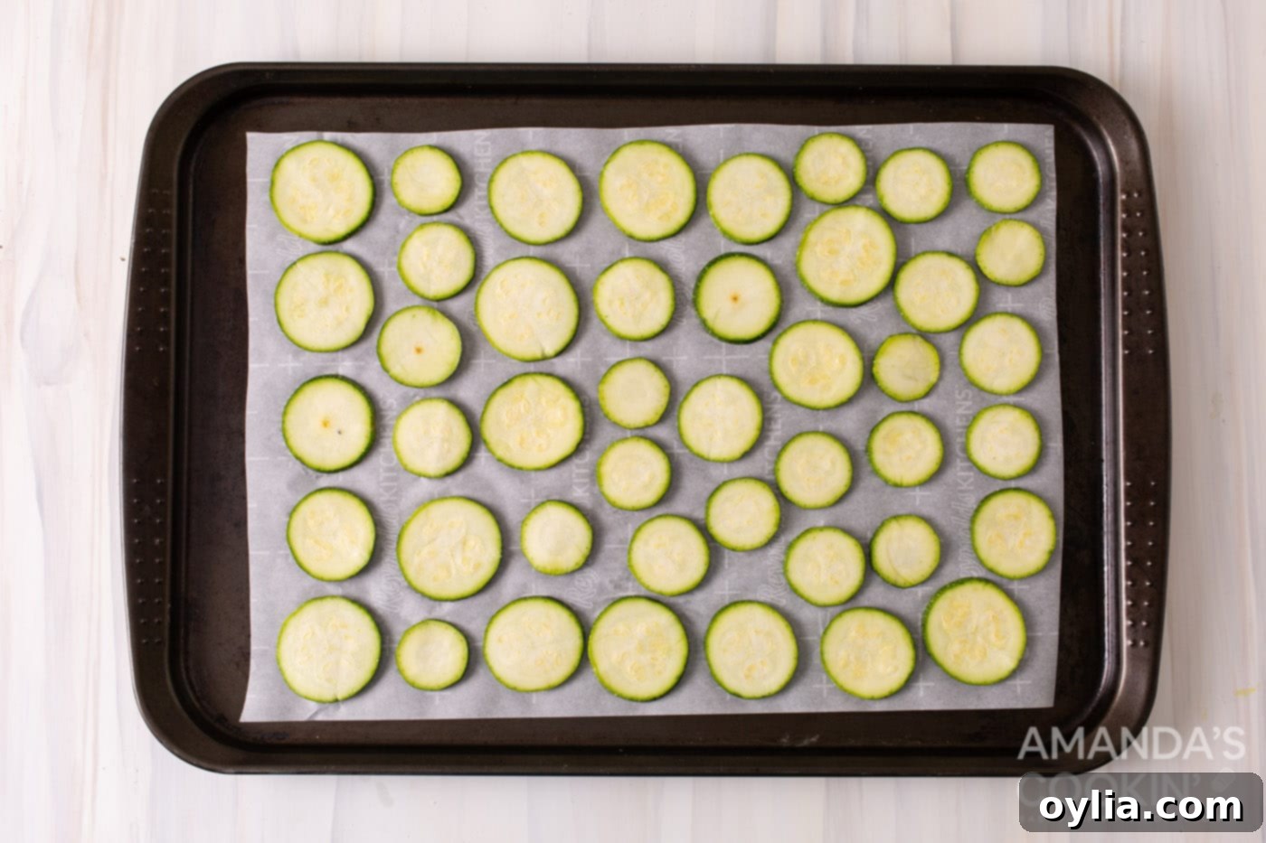 sliced zucchini on a sheet pan