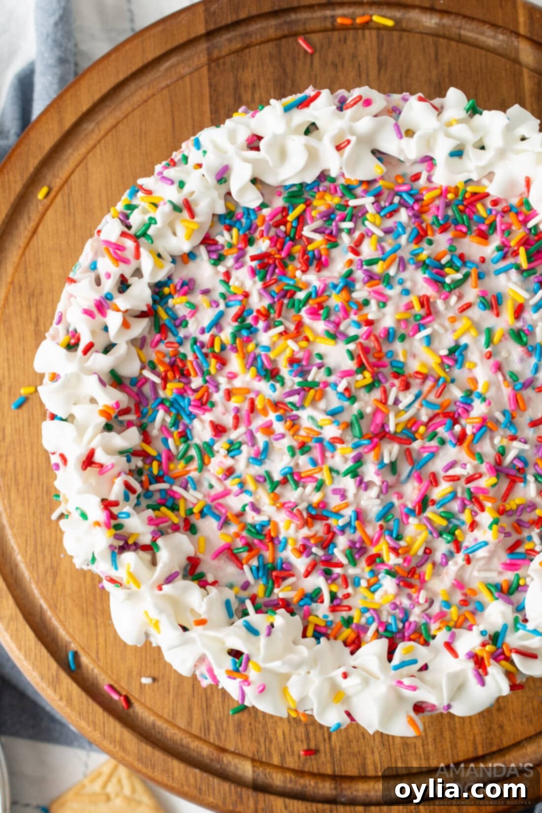 No-Bake Rainbow Sprinkle Delight 3 overhead shot of Funfetti Icebox Cake with colorful sprinkles