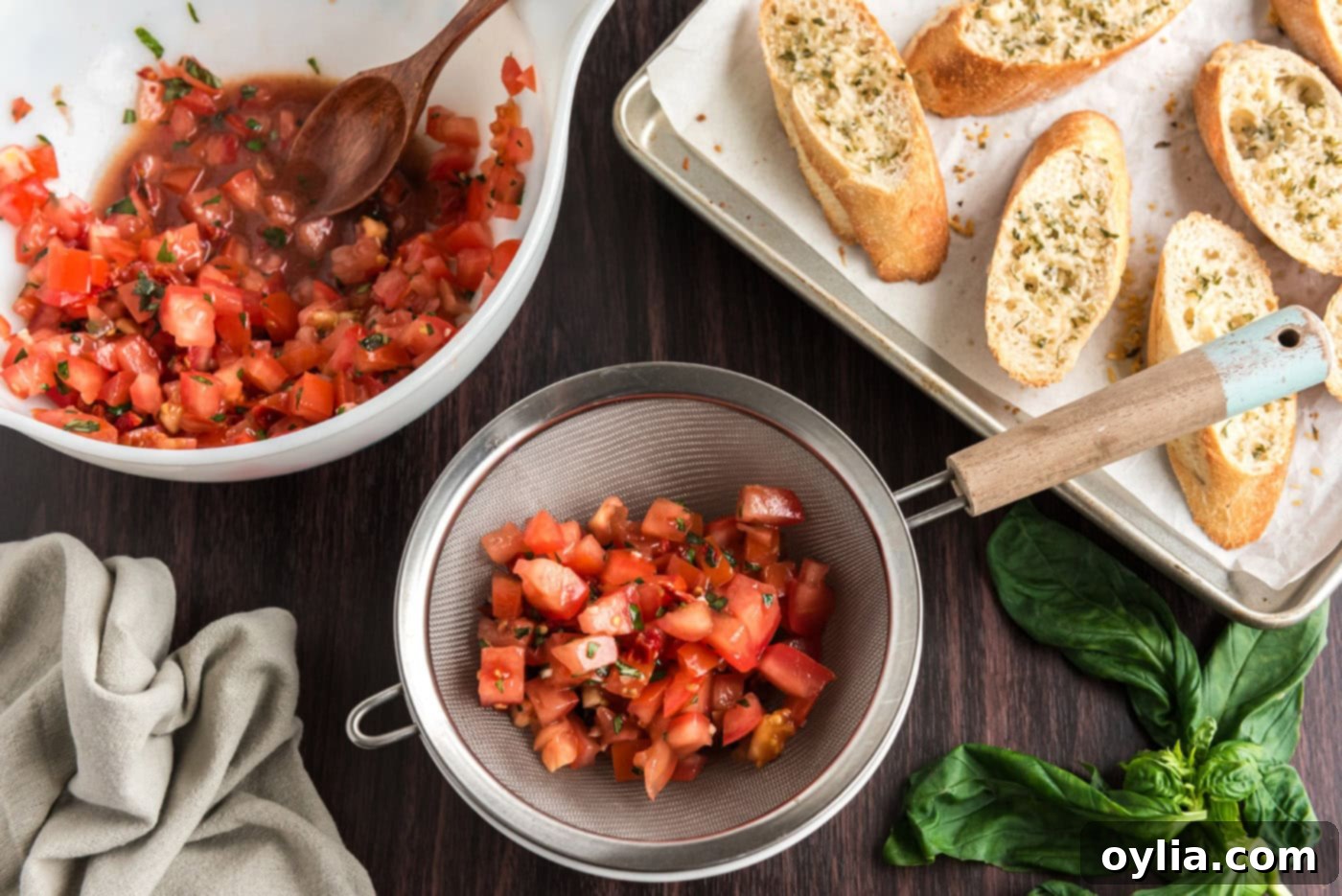 draining bruschetta tomato mixture