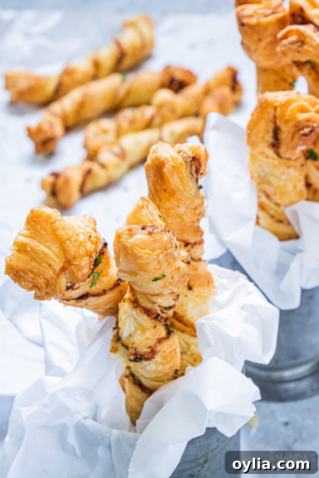 Air Fryer Garlic Parmesan Twists in small serving baskets