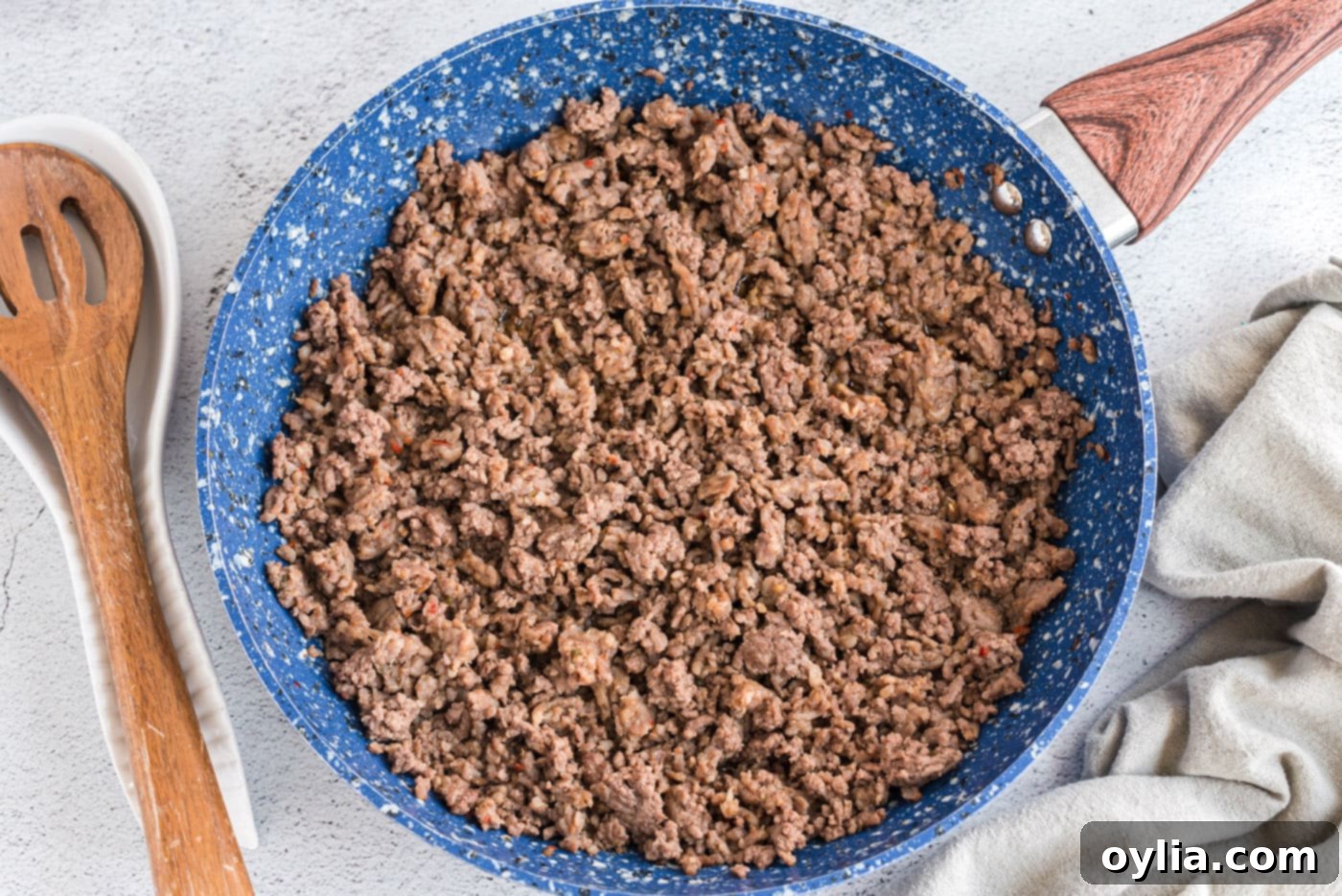 browned ground beef and sausage in a skillet