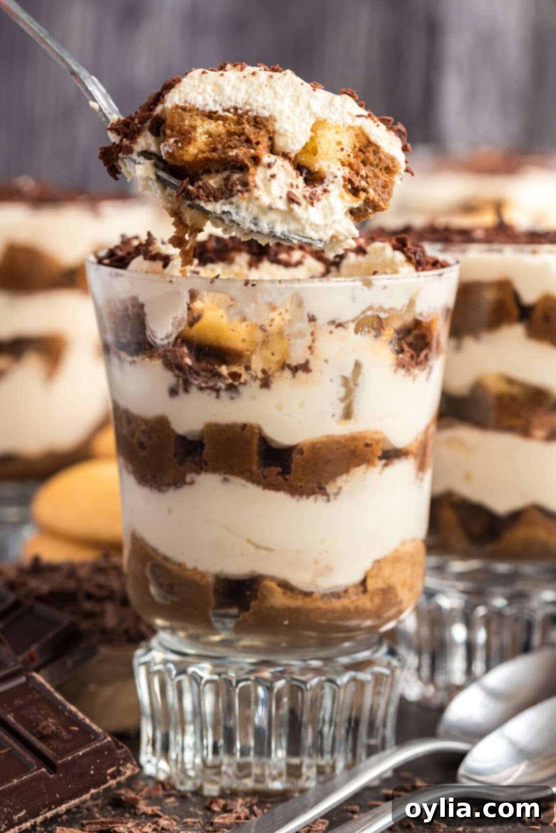 Spoonful of Bailey's Tiramisu Parfait being lifted out of the parfait cup