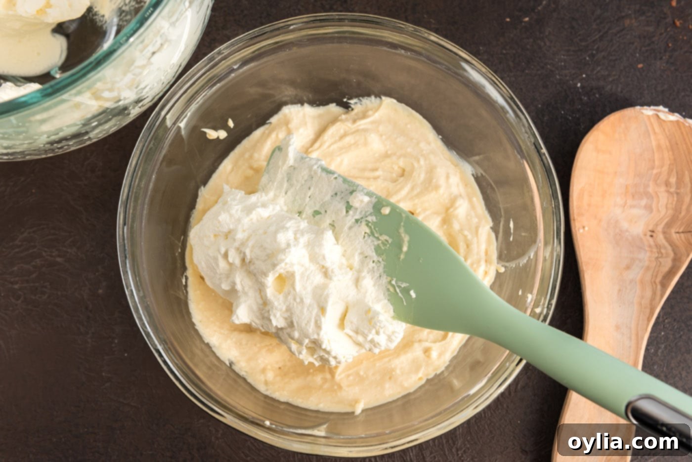 folding whipped cream into bailey's mascarpone mixture
