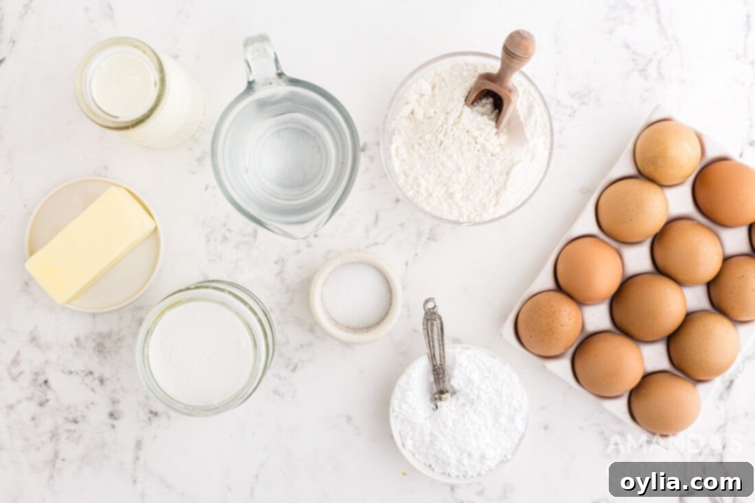 Cream Puff ingredients laid out on a table including butter, water, sugar, salt, flour, and eggs