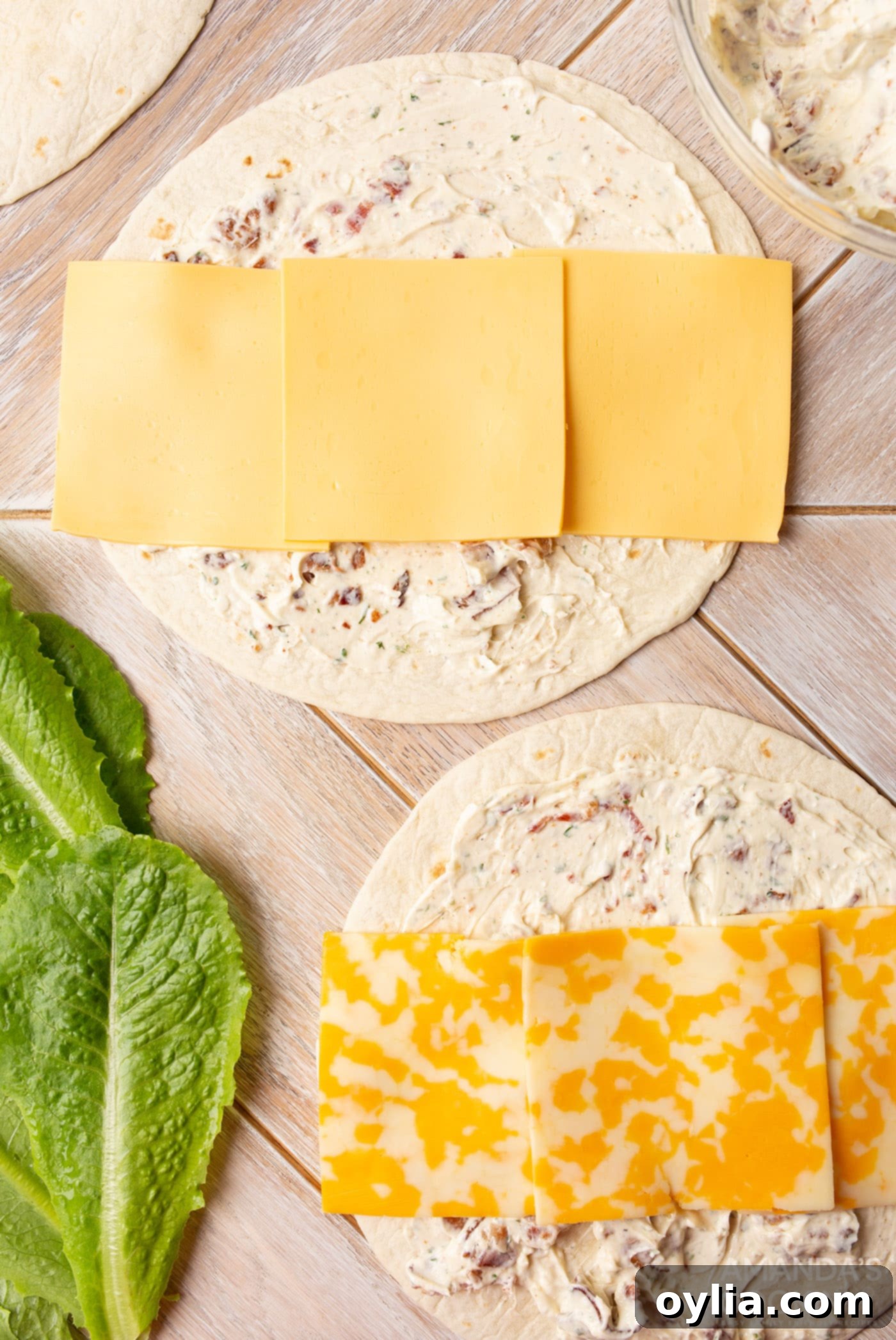 cheese on top of tortilla with cream cheese
