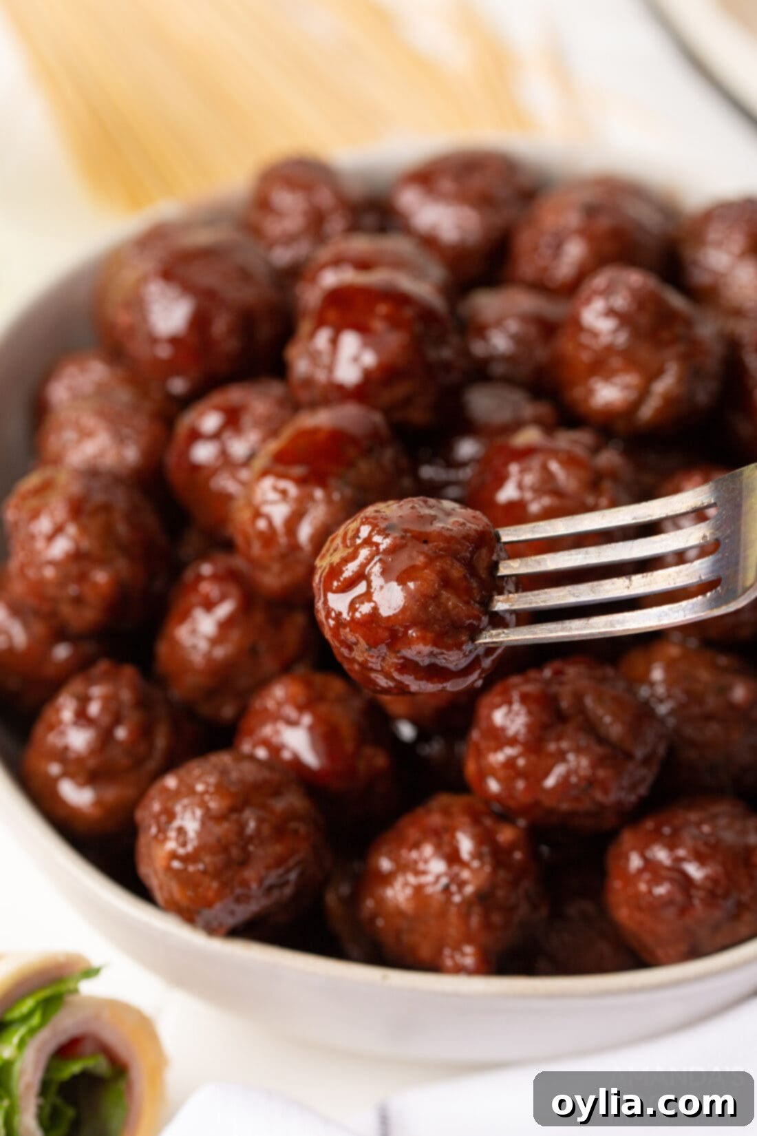 Sweet and Tangy Grape Jelly Meatballs 7 bowl of grape jelly meatballs