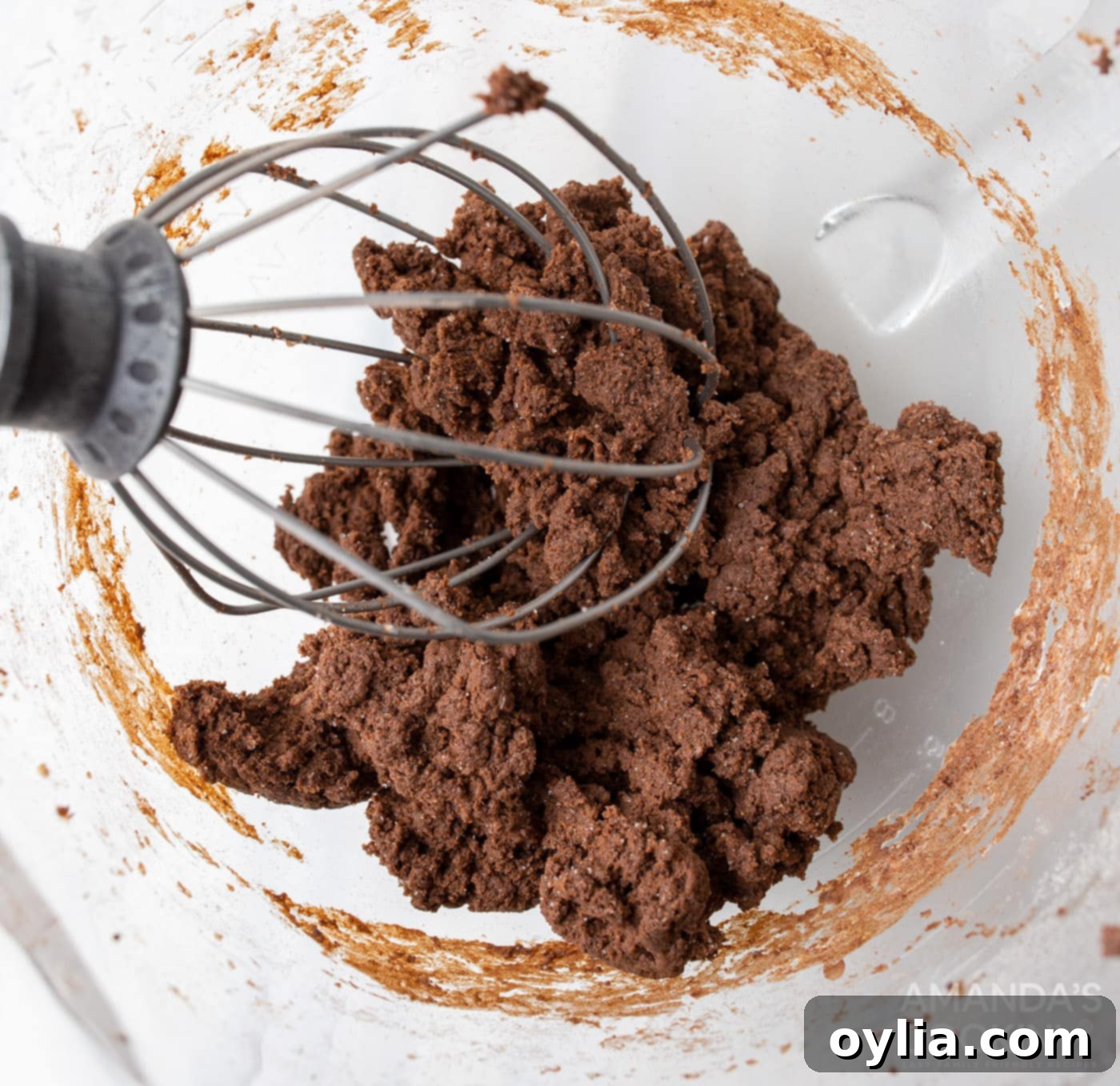 chocolate pudding with cream cheese in stand mixer bowl