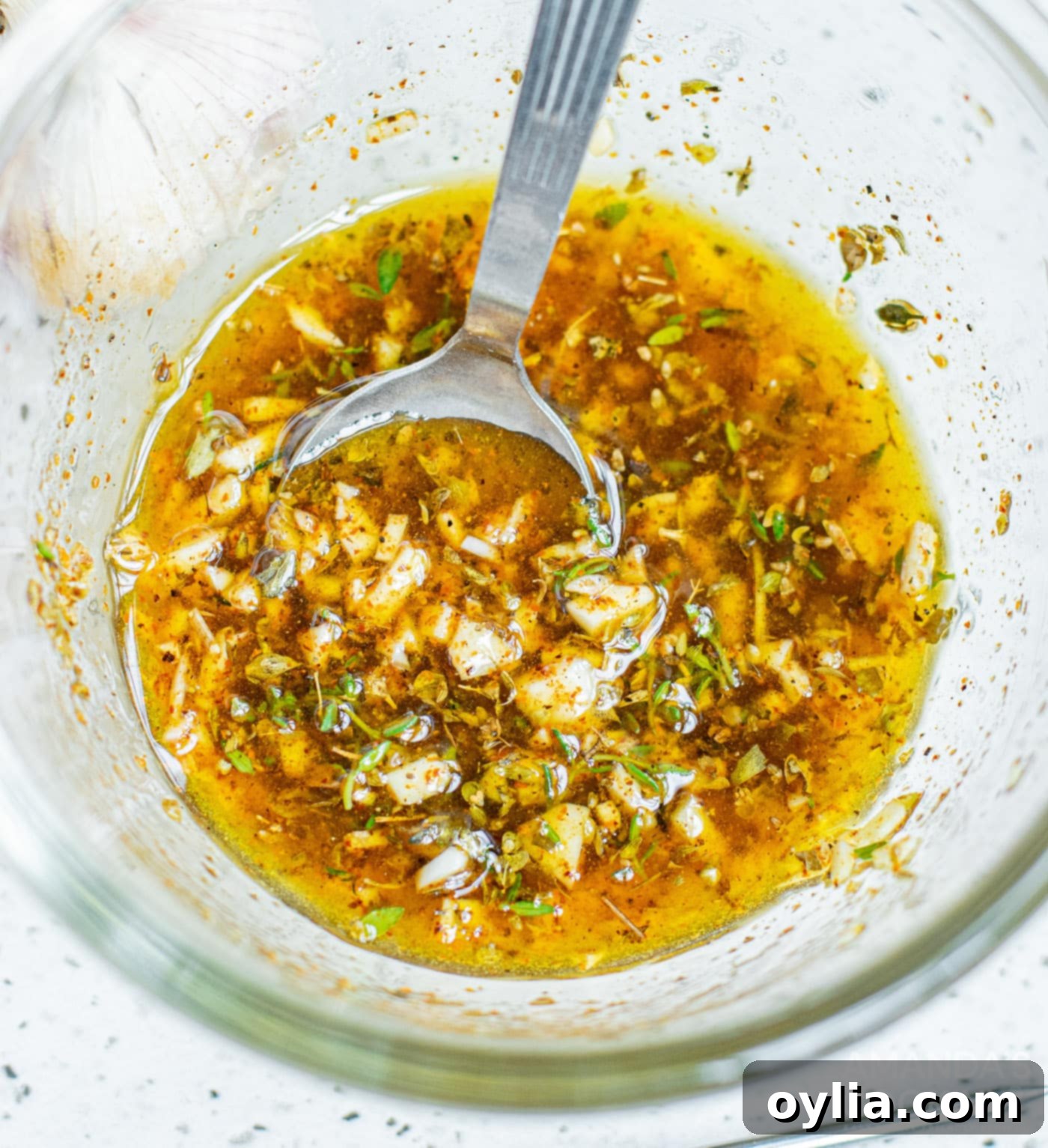 Mixing marinade ingredients in a bowl