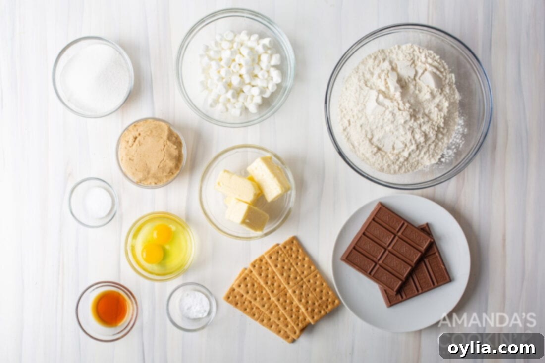 All the necessary ingredients for s'mores cookies, neatly arranged on a counter