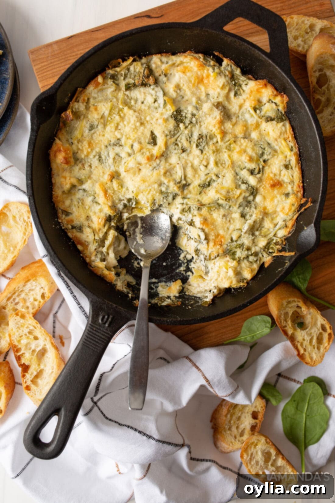 cast iron pan of Spinach Artichoke Dip