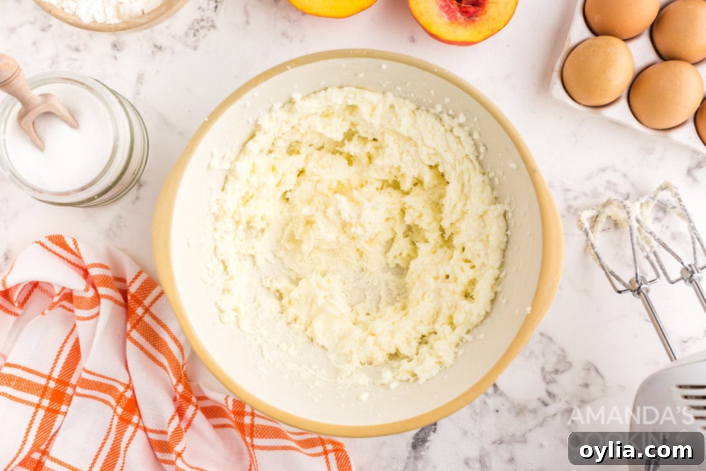 Golden Peach Upside Down Cake 7 beaten butter and sugar in a bowl