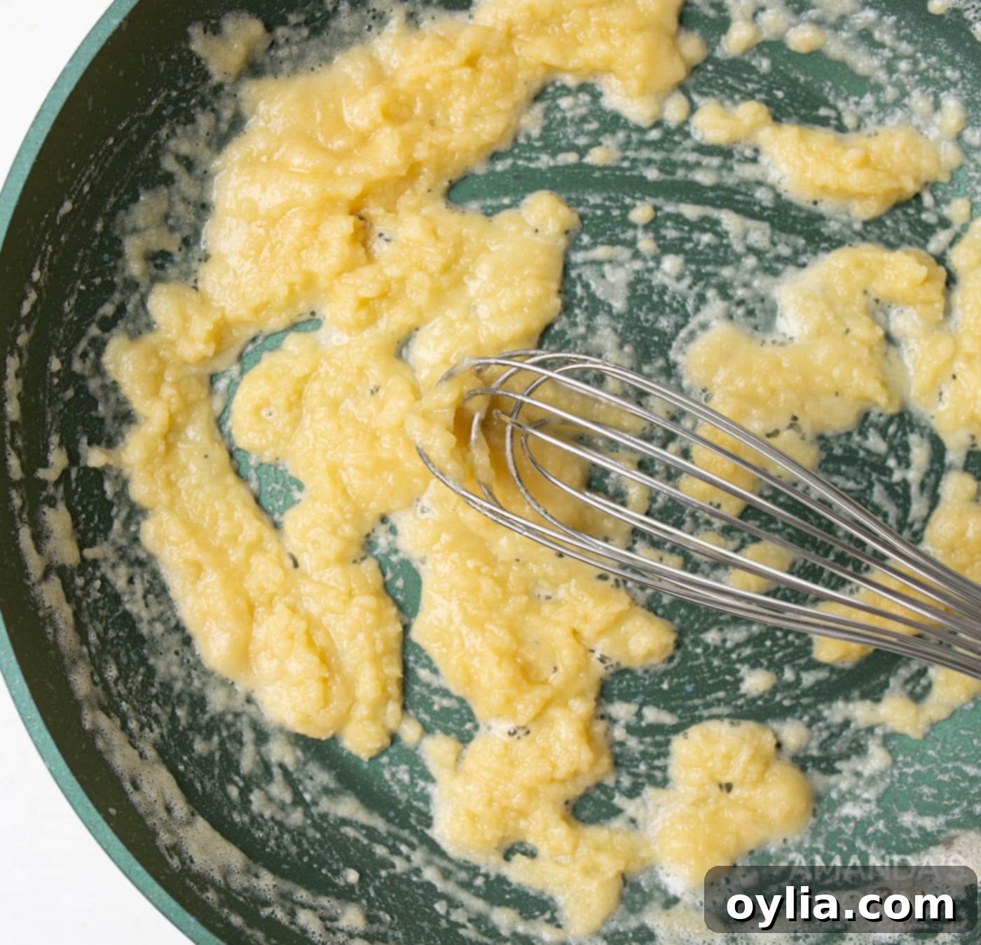 whisking butter and flour in a skillet