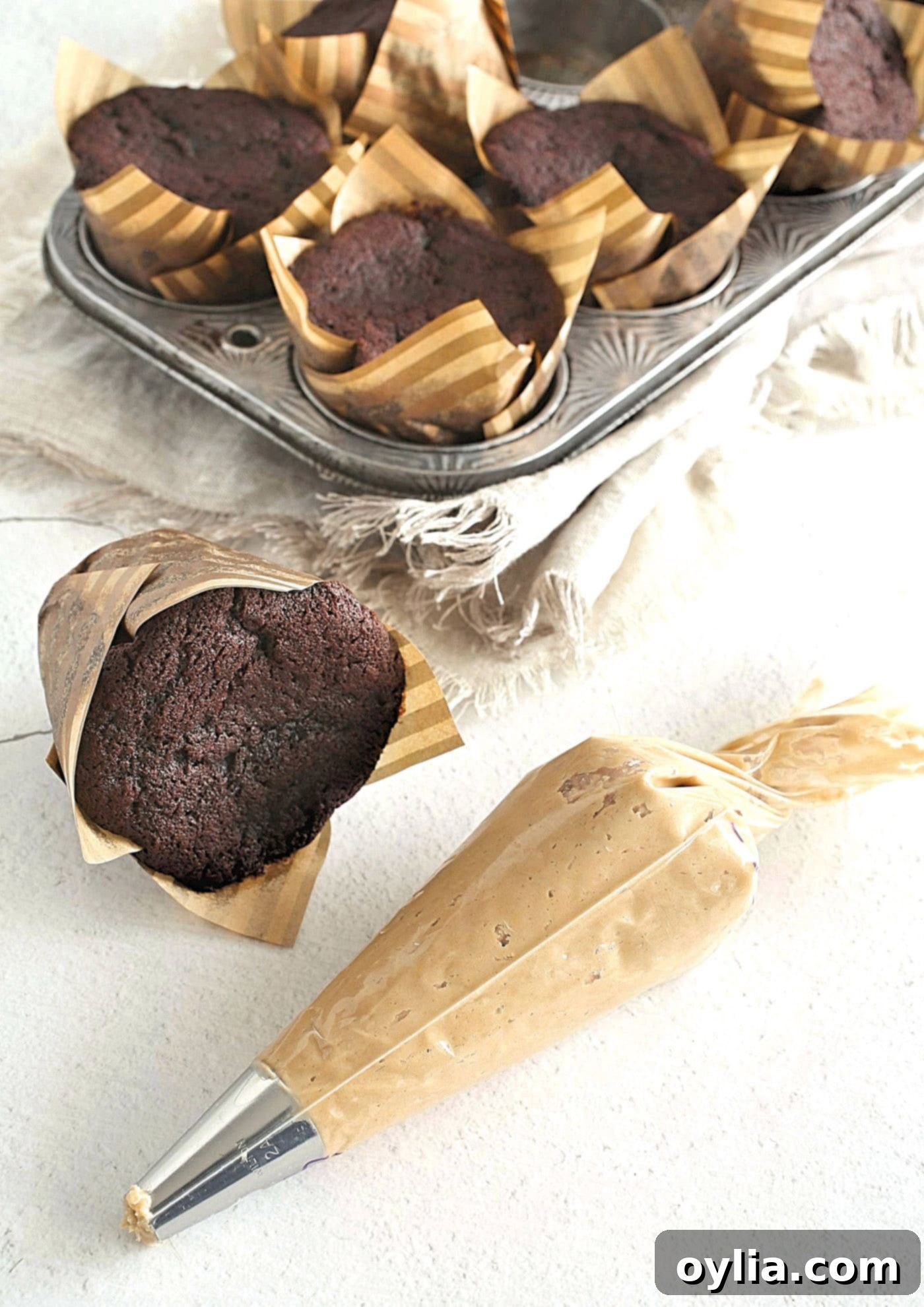 chocolate cupcake with peanut butter frosting in a bag
