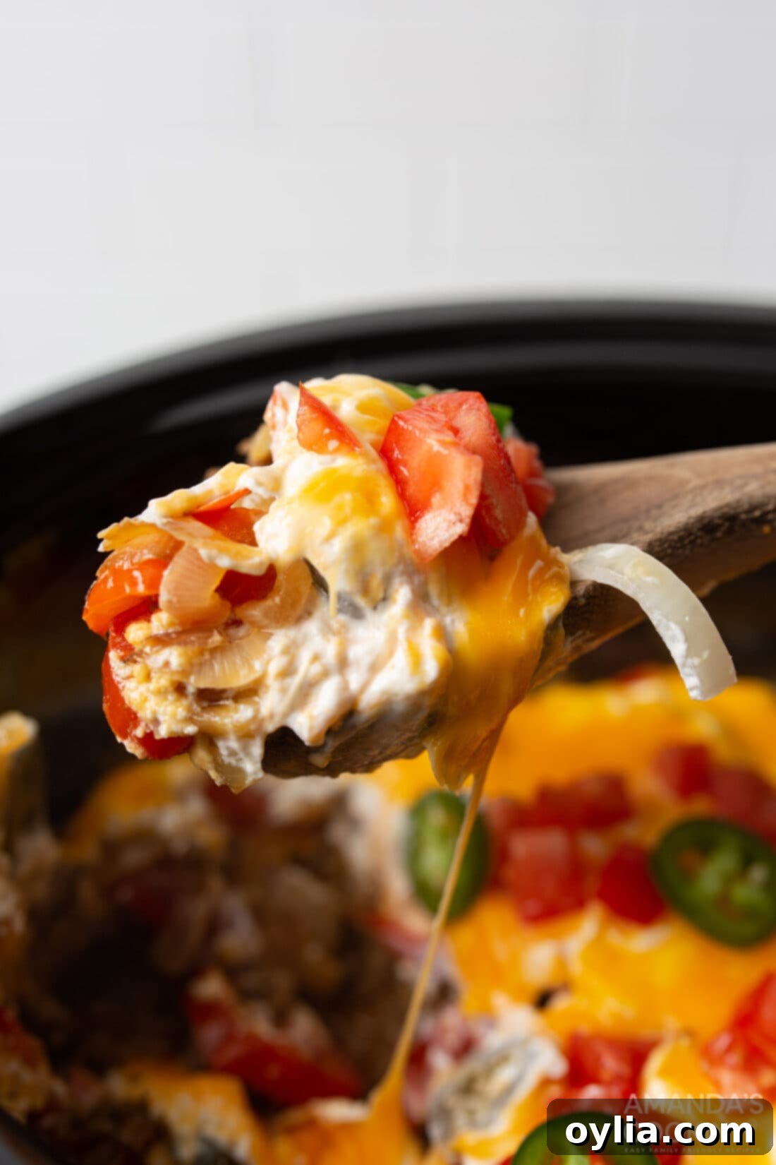 serving spoon of crockpot john wayne casserole