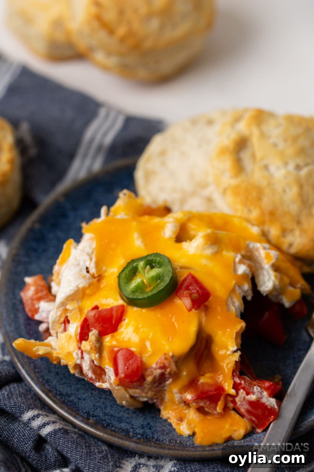 crockpot john wayne casserole with a biscuit on a plate