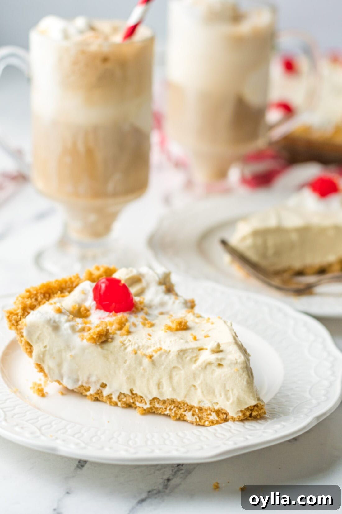 Frothy Root Beer Float Delight 11 slice of Root Beer Float Pie on a plate