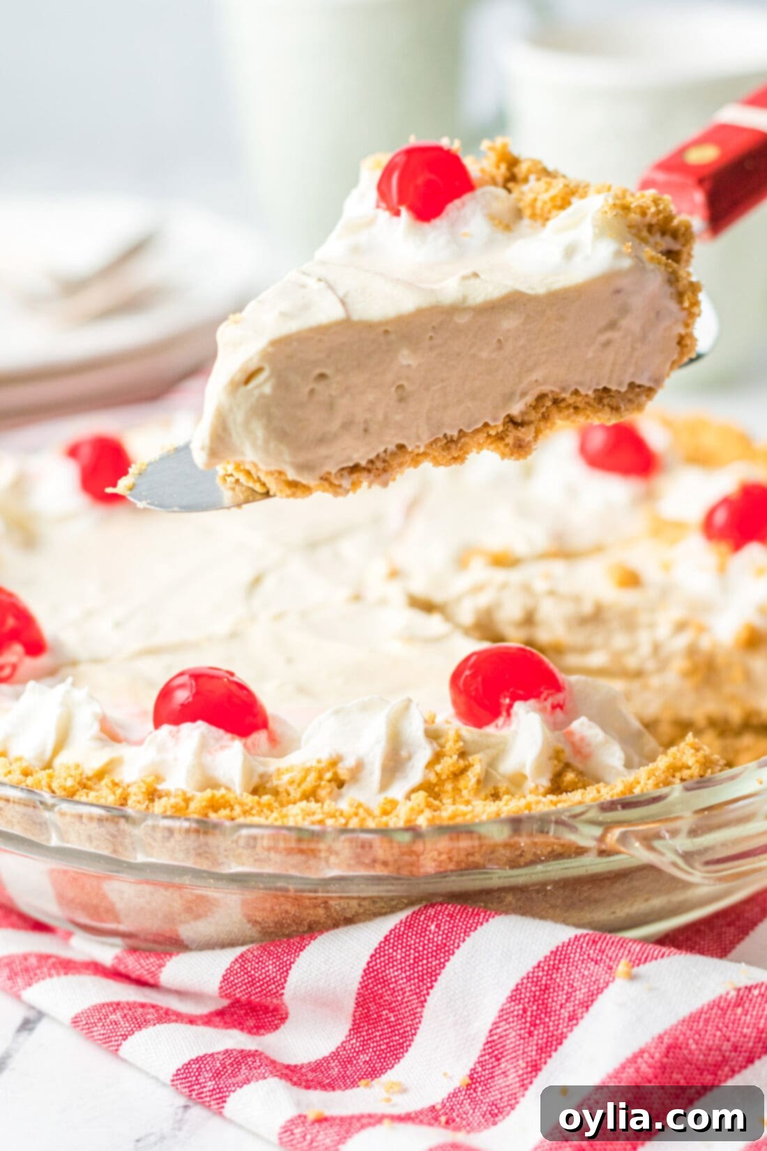 Frothy Root Beer Float Delight 3 lifting a slice of Root Beer Float Pie