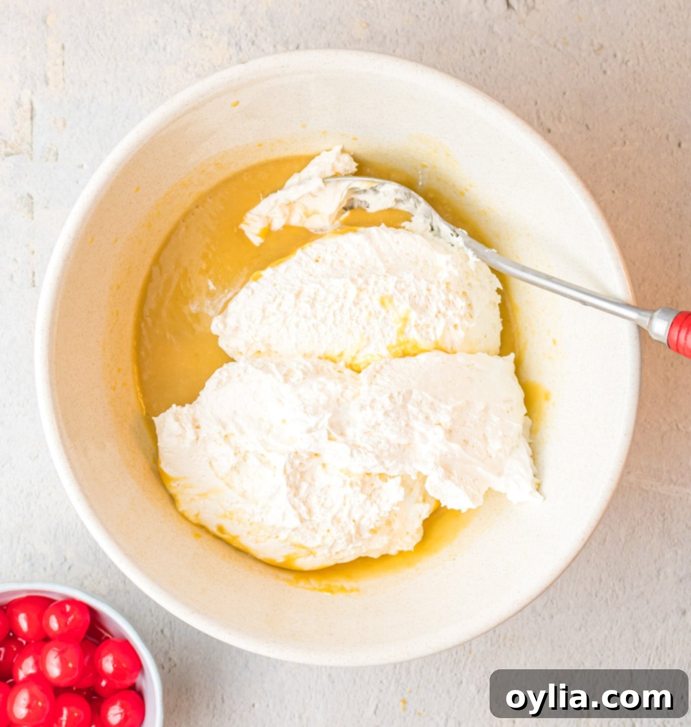 folding in cool whip to root beer pie mixture