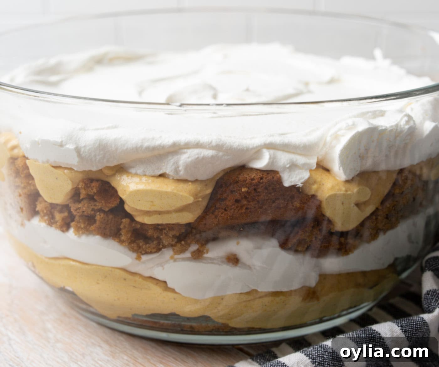 The fully assembled pumpkin trifle before final garnish, showing all its distinct layers.