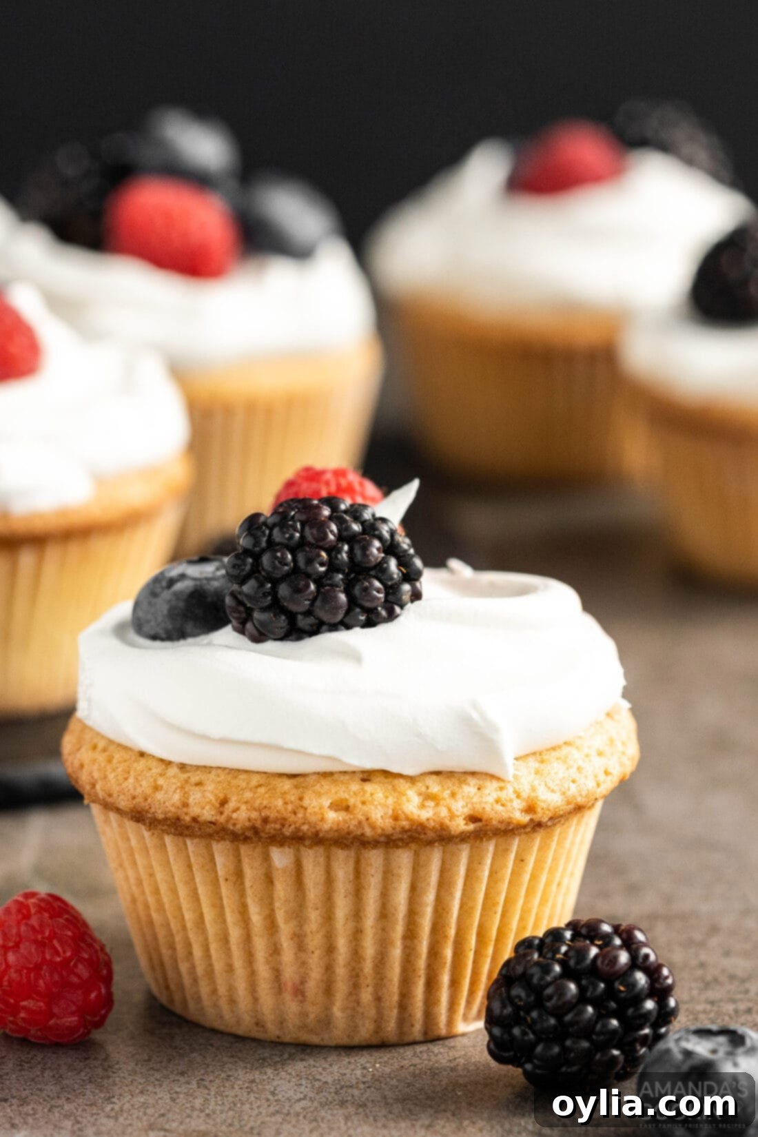 Miniature Pound Cakes 3 Pound Cake Cupcake with berry garnish