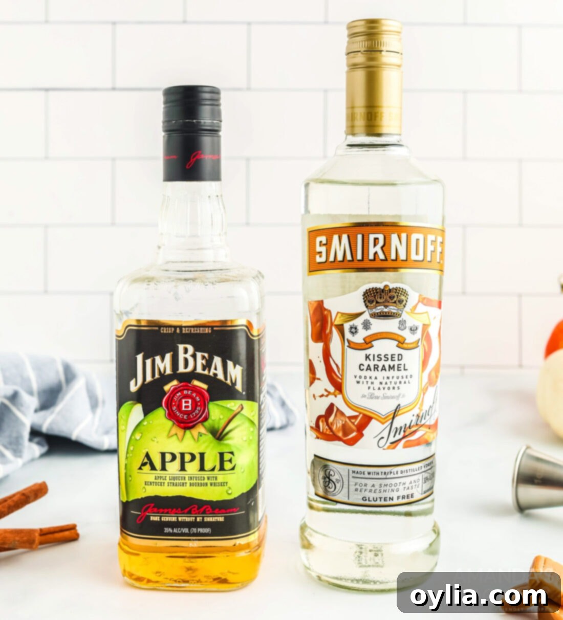 Bottles of apple whiskey and caramel vodka, the key alcoholic ingredients