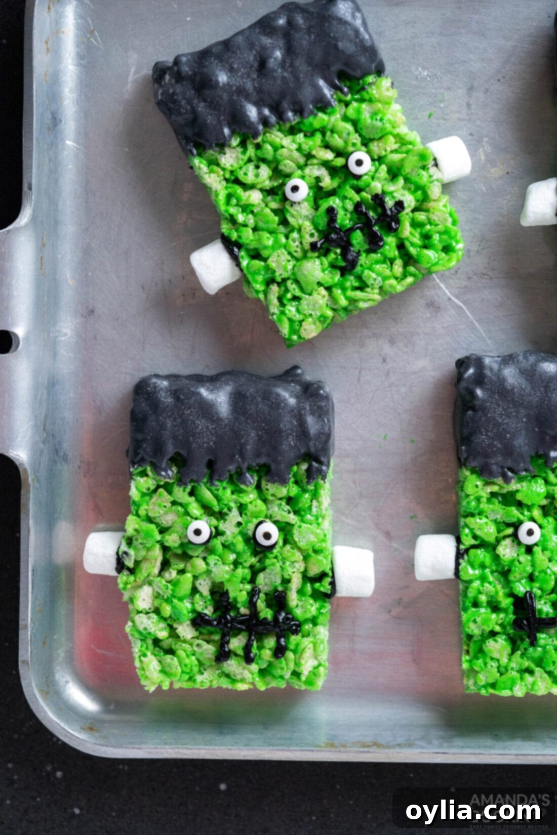 Monster Mash Krispie Treats 2 Frankenstein Rice Krispie Treats on a pan