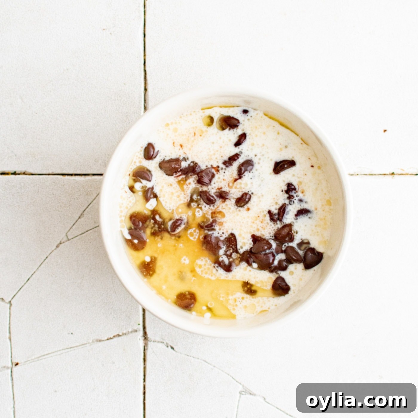 heavy cream and butter in a bowl of chocolate chips