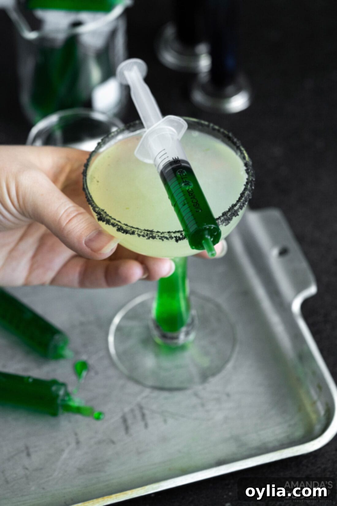 The Reanimated Margarita 8 lifting a Frankenstein Margarita