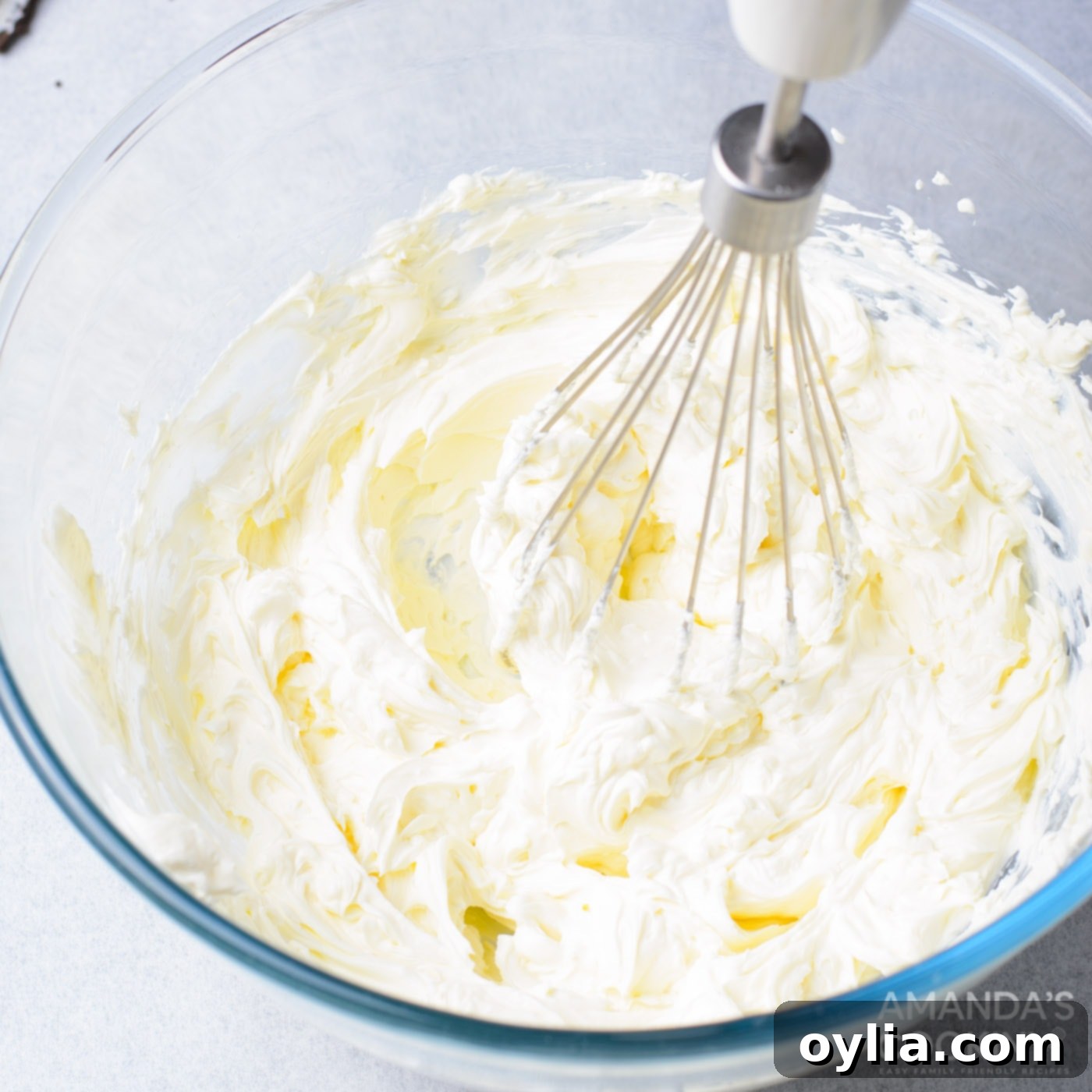 mixing cream cheese