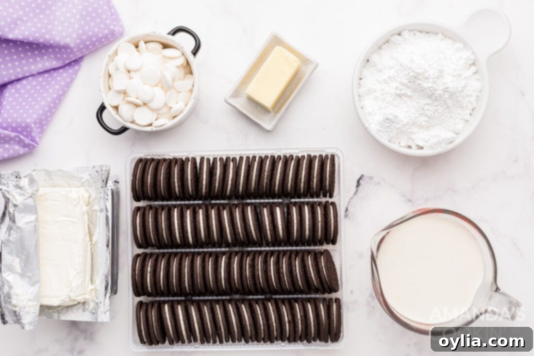 Ingredients for Oreo Cheesecake laid out on a countertop, ready for preparation.