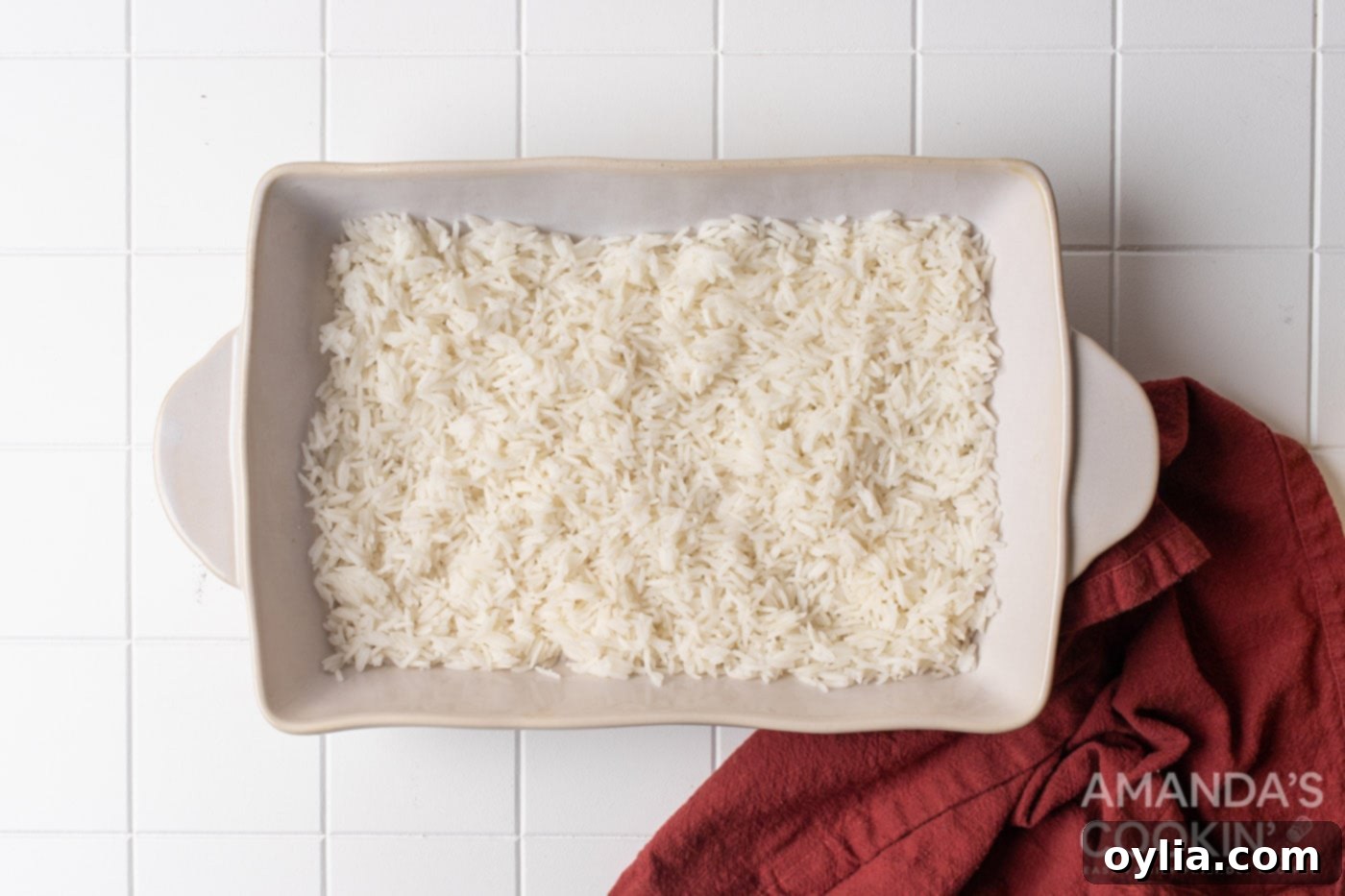 Stacked Supper Supreme 5 cooked white rice in casserole dish