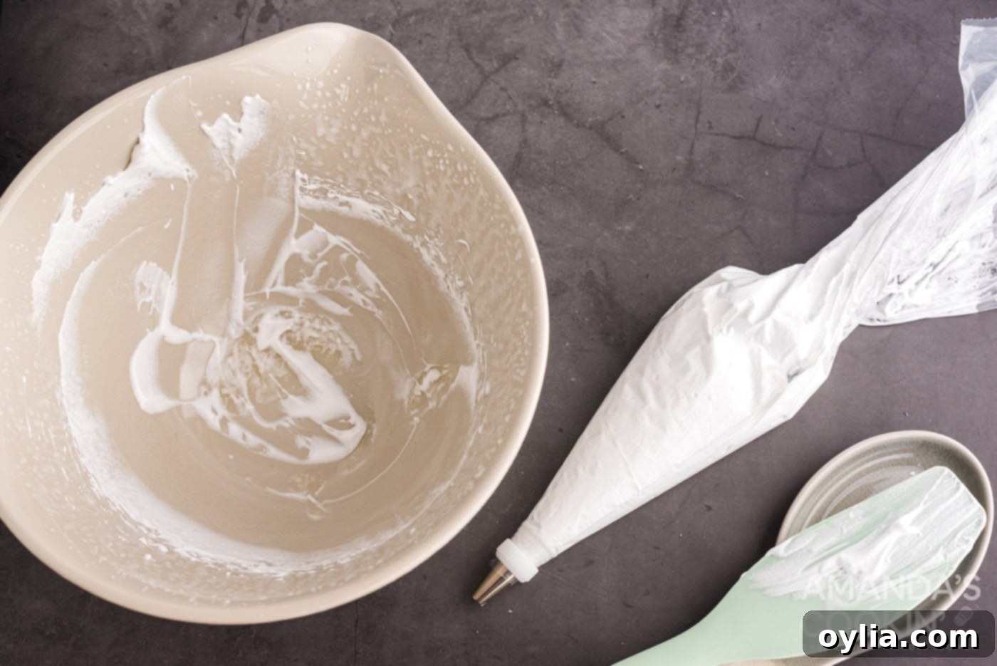 marshmallow cream in a piping bag, ready for decorating.