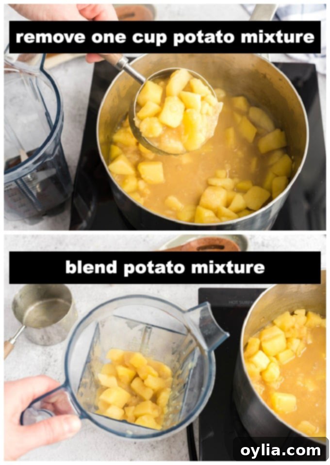 Carefully scooping out one cup of the cooked potato and broth mixture from the pan to transfer to a blender.