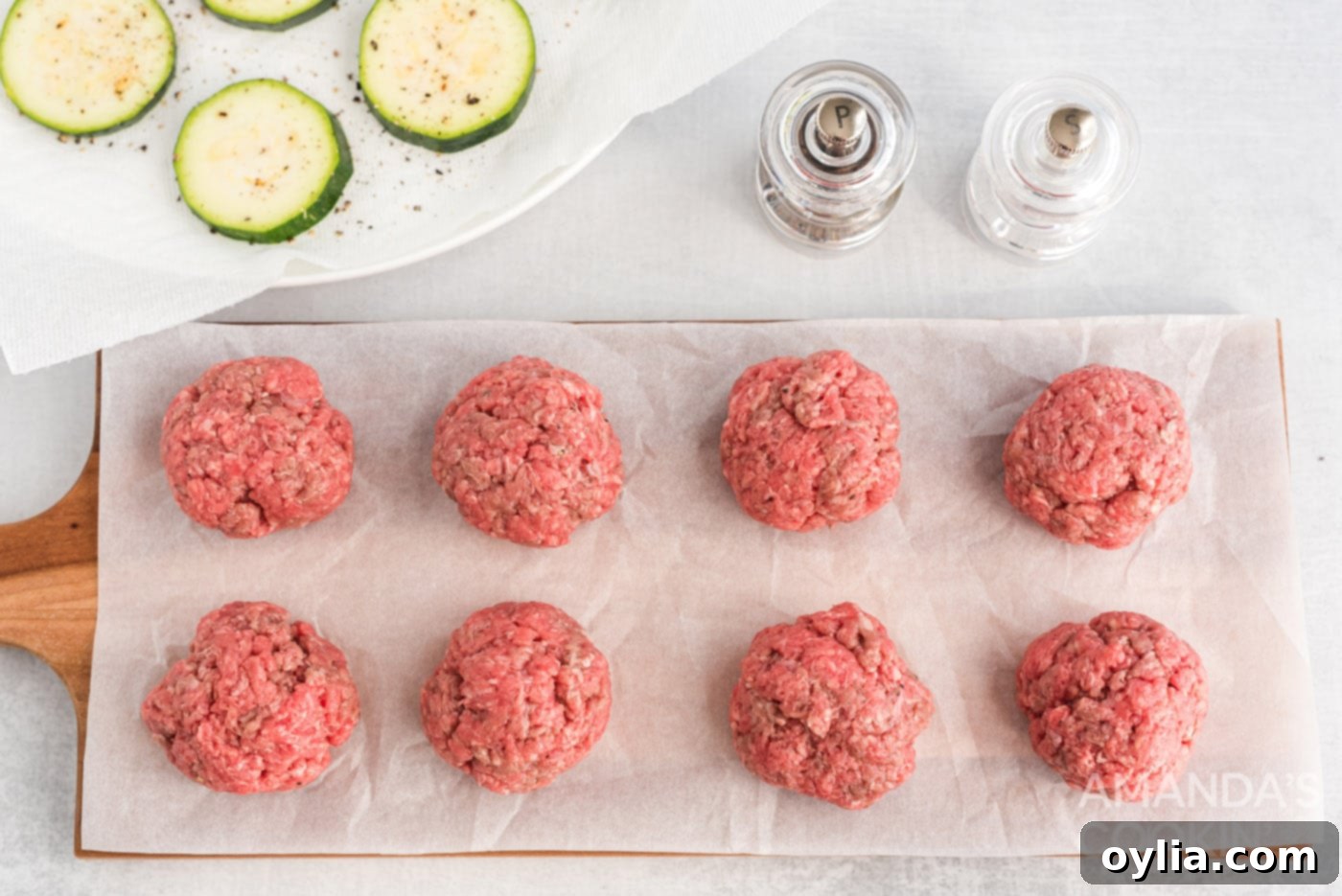 mini burger patties on parchment paper