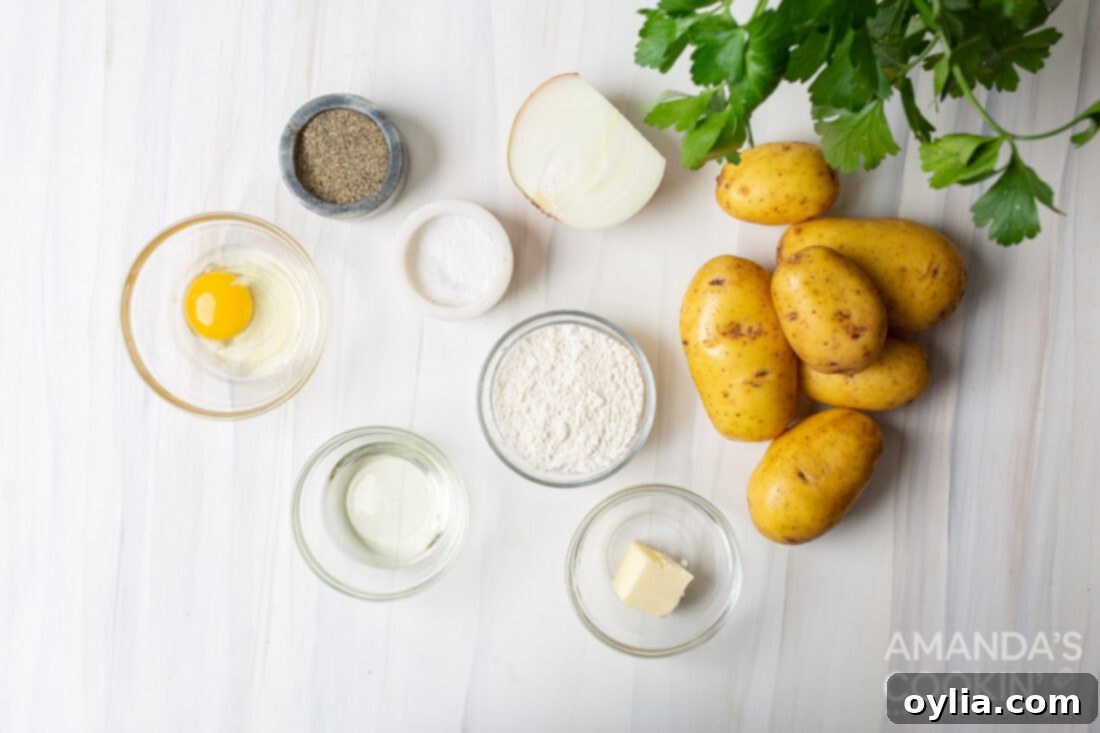 Potato Fritters 4 All ingredients laid out on a wooden board: potatoes, onion, flour, egg, salt, pepper, oil, and butter.