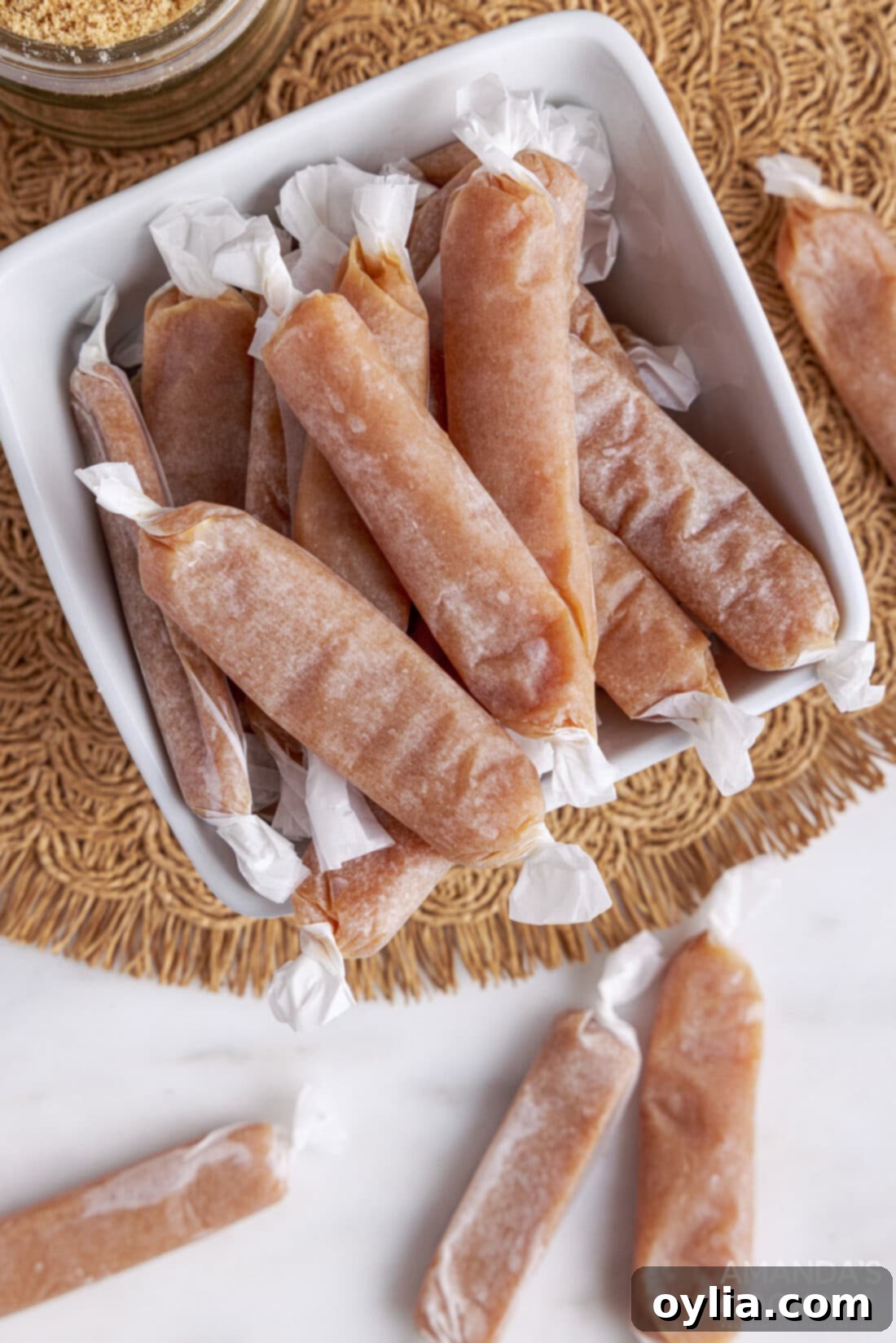 Overhead view of homemade Microwave Caramels, perfectly cut and ready.