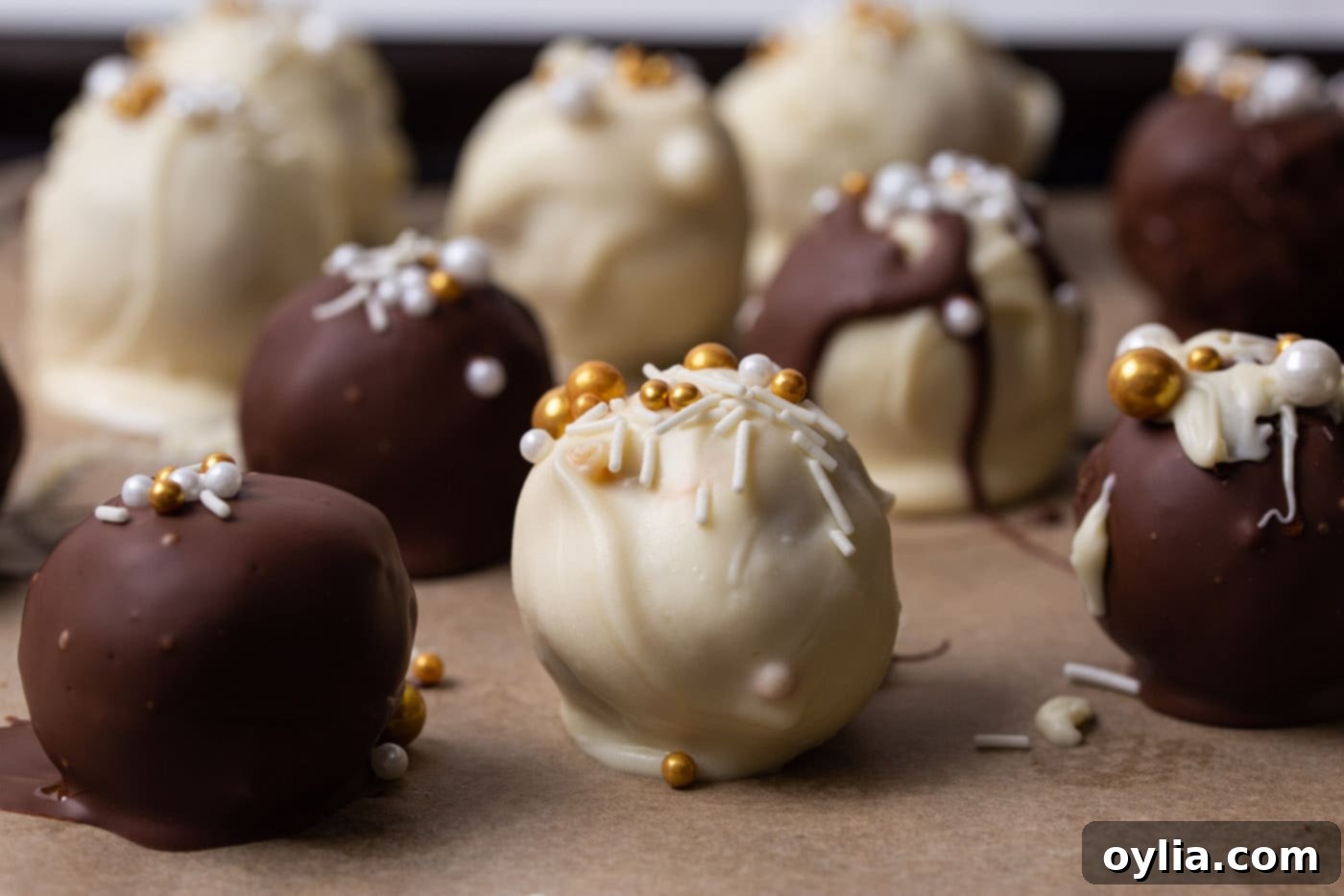 A collection of freshly dipped and decorated cake balls