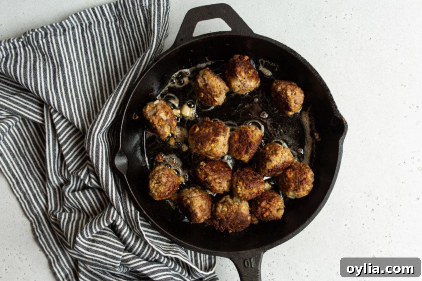 browned swedish meatballs in a skillet