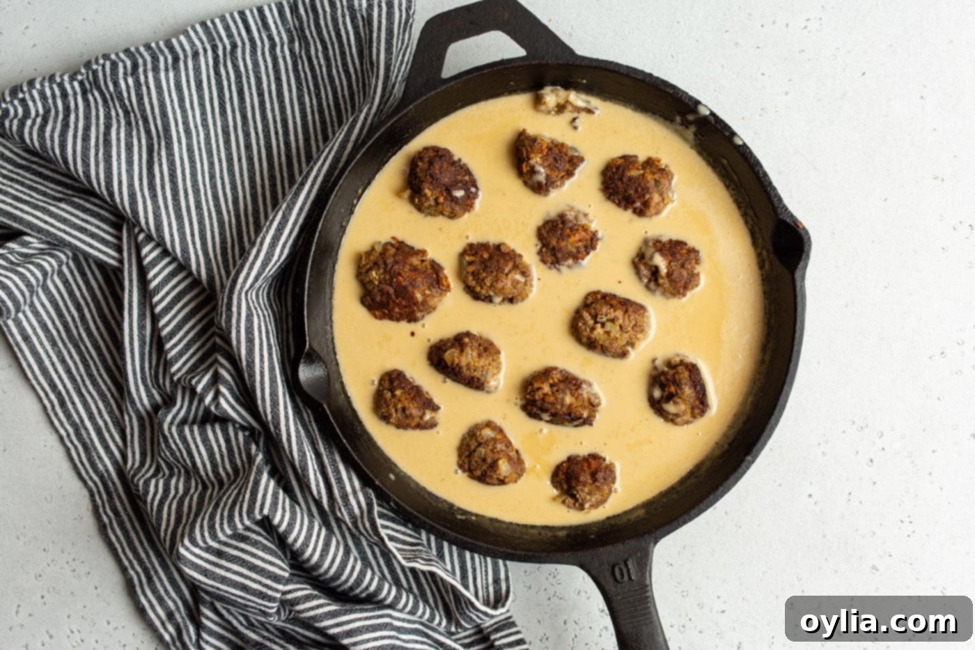 meatballs in gravy sauce in skillet