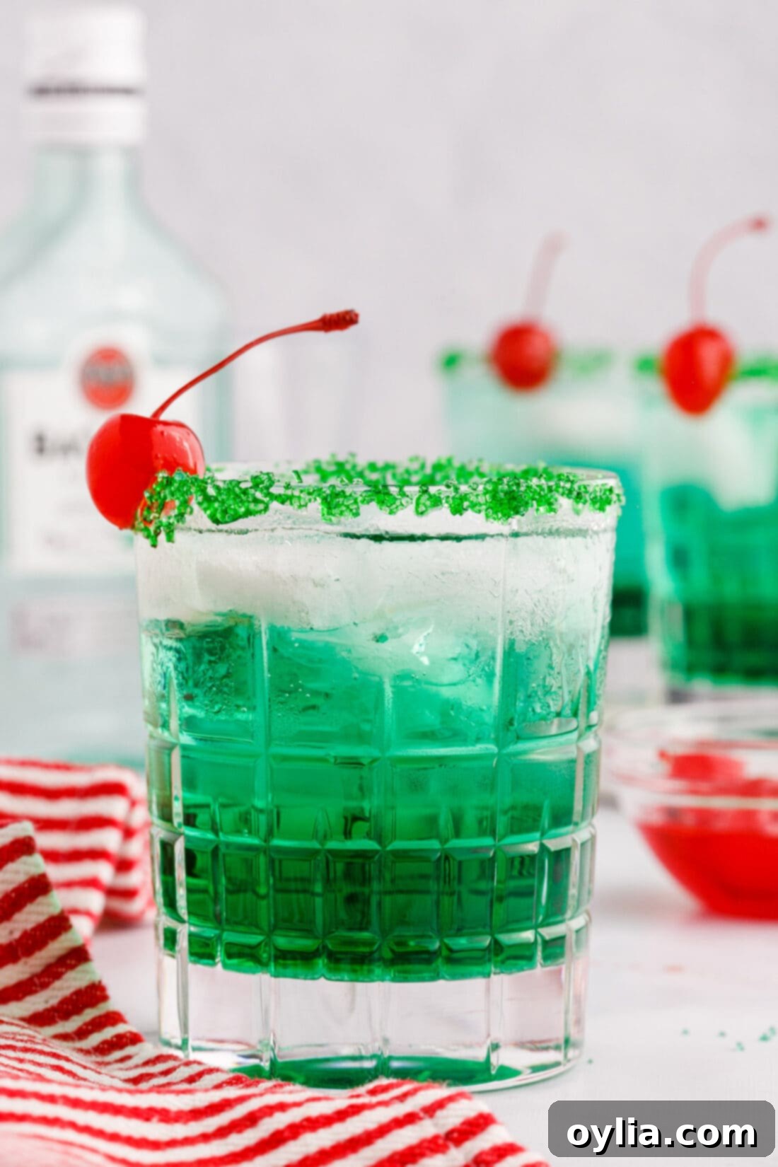 Two Grinch Cocktails on a festive background, ready to be served