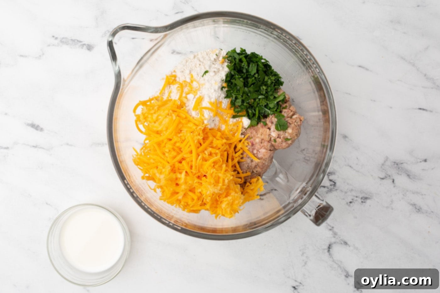 sausage ball ingredients in a mixing bowl