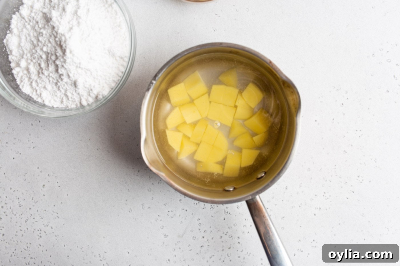 boiling potatoes in a saucepan