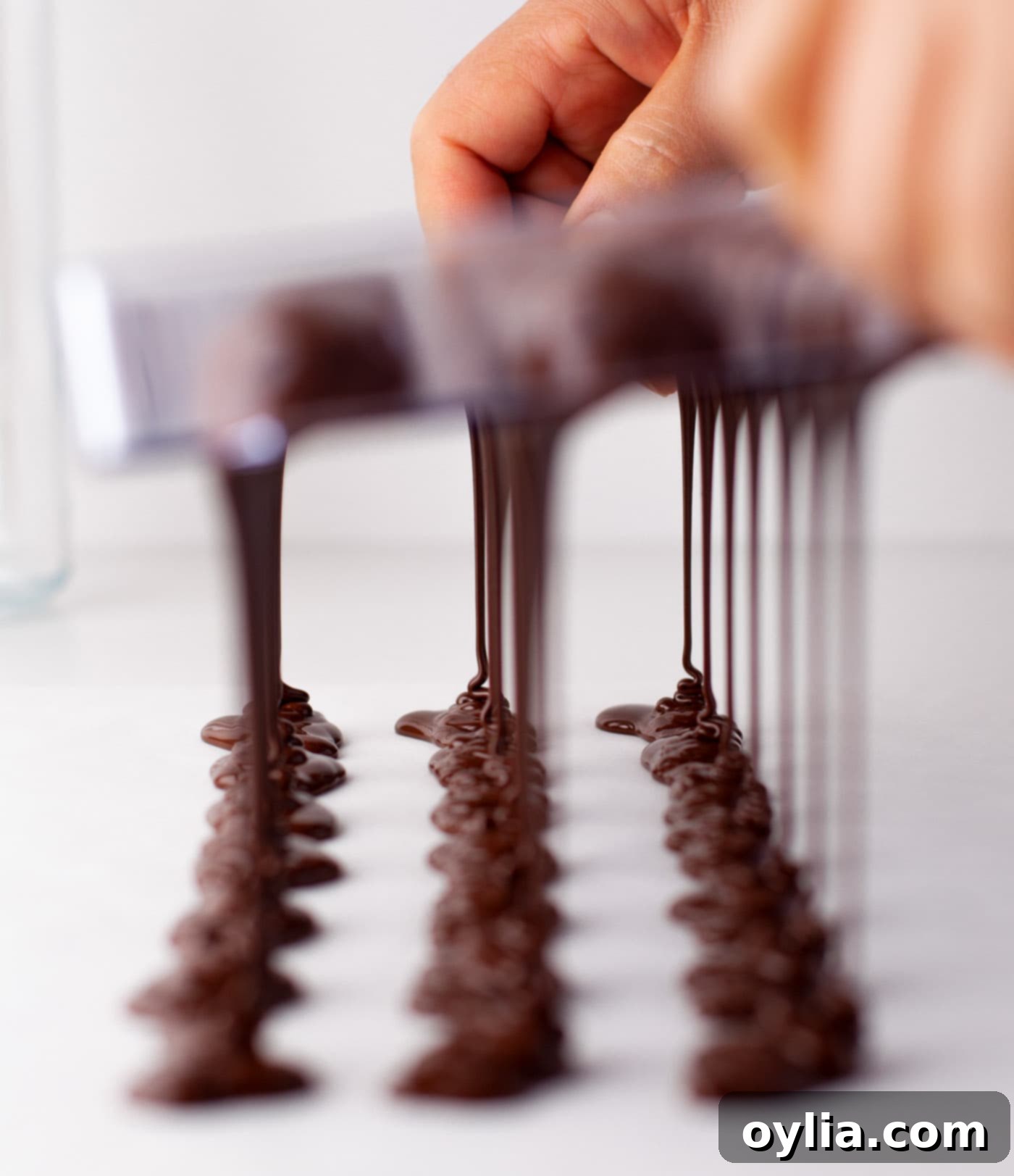 chocolate dripping out of candy mold