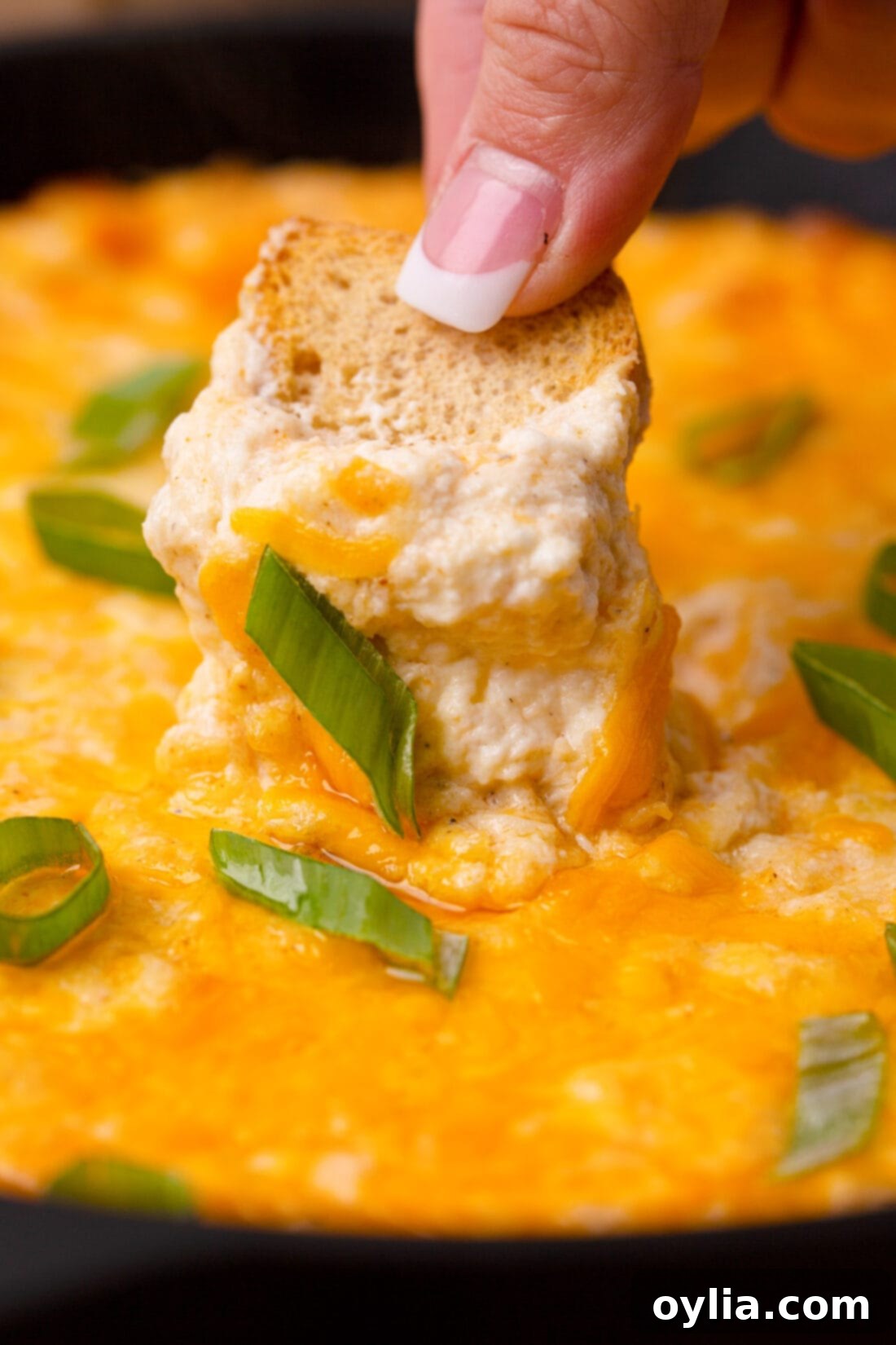 Ultimate Crab Dip 3 scooping Crab Dip